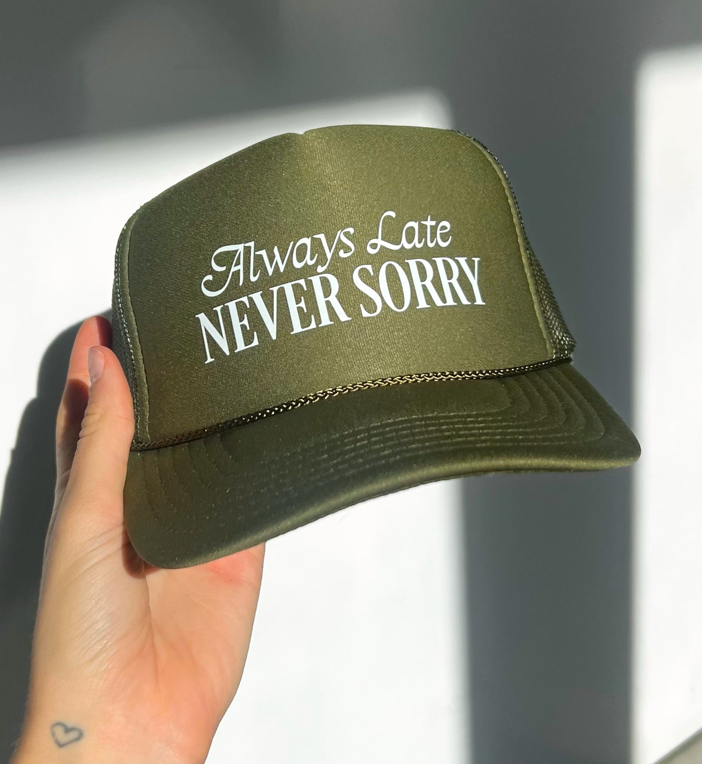 “Always Late Never Sorry” Trucker Hat