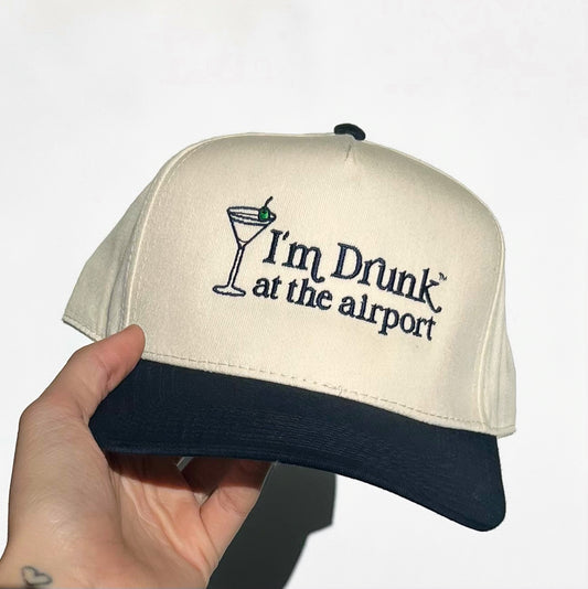"Drunk At The Airport" Vintage Trucker Hat