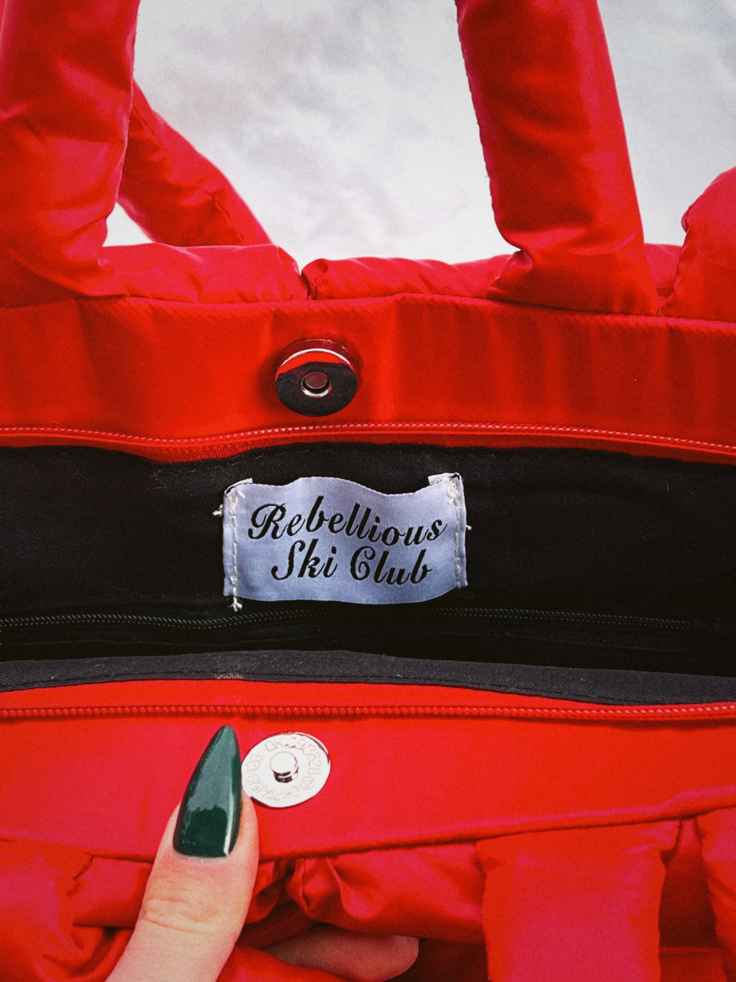 Rebellious Ski Club Puffer Bag